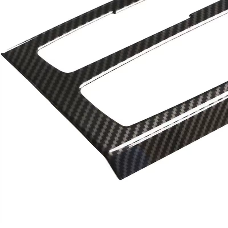Carbon klímapanel díszléc sarka és szövésmintája közelről – BMW F30 / F32