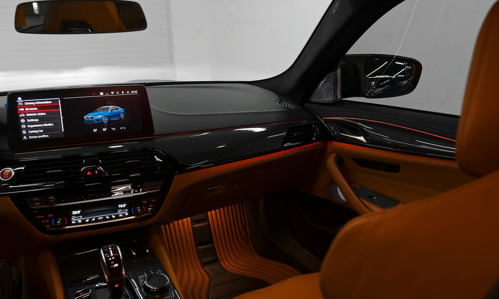 BMW F90 M5 dashboard and door with gloss carbon interior trims and light brown leather