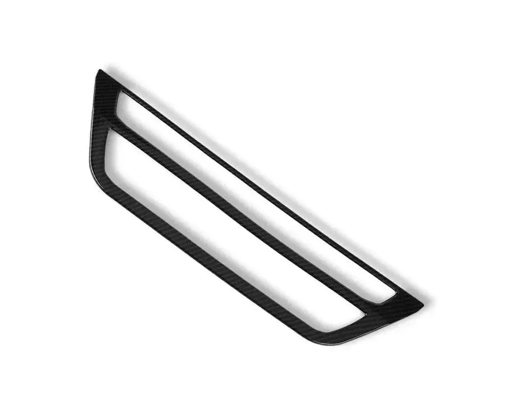 Carbon trim frame for the climate and CD panel from a steep angle – BMW F90 M5 and G30 5 Series