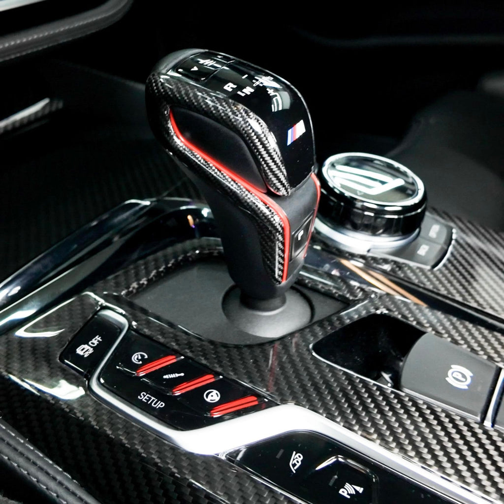 Carbon gear lever trim fitted to a BMW M gear lever, with carbon console – BMW F90 M5