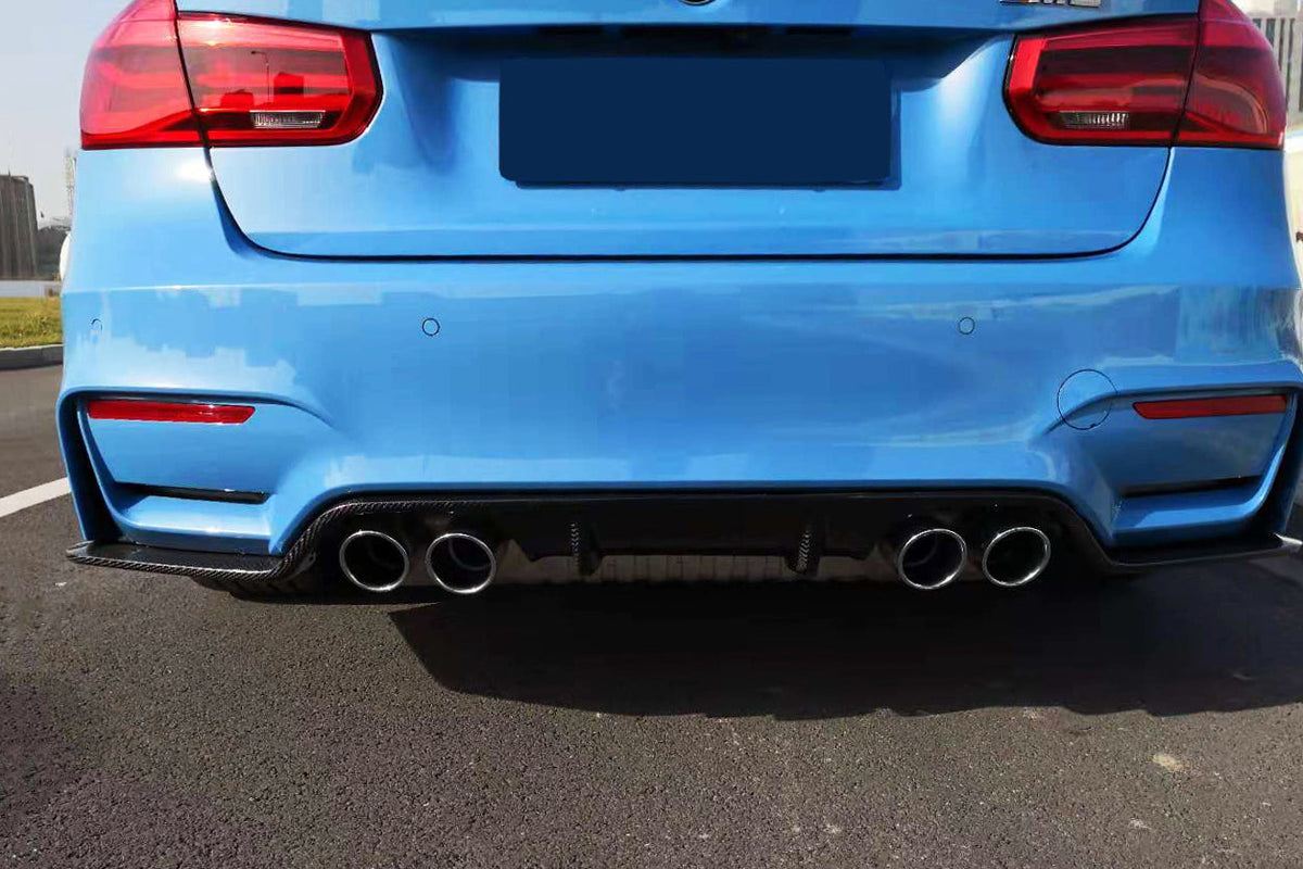 Blue BMW F80 M3 straight from the rear, close-up, with fitted carbon diffuser (D3 Style)