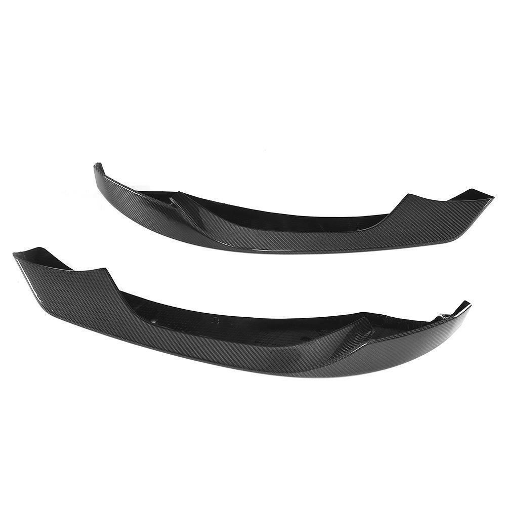 Two carbon lip pieces, angled view, on a white background (AC Style) – BMW F80 M3 / F82 M4