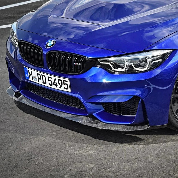 Blue BMW F82 M4 CS front close-up from a low angle, with fitted front lip (CS Style)