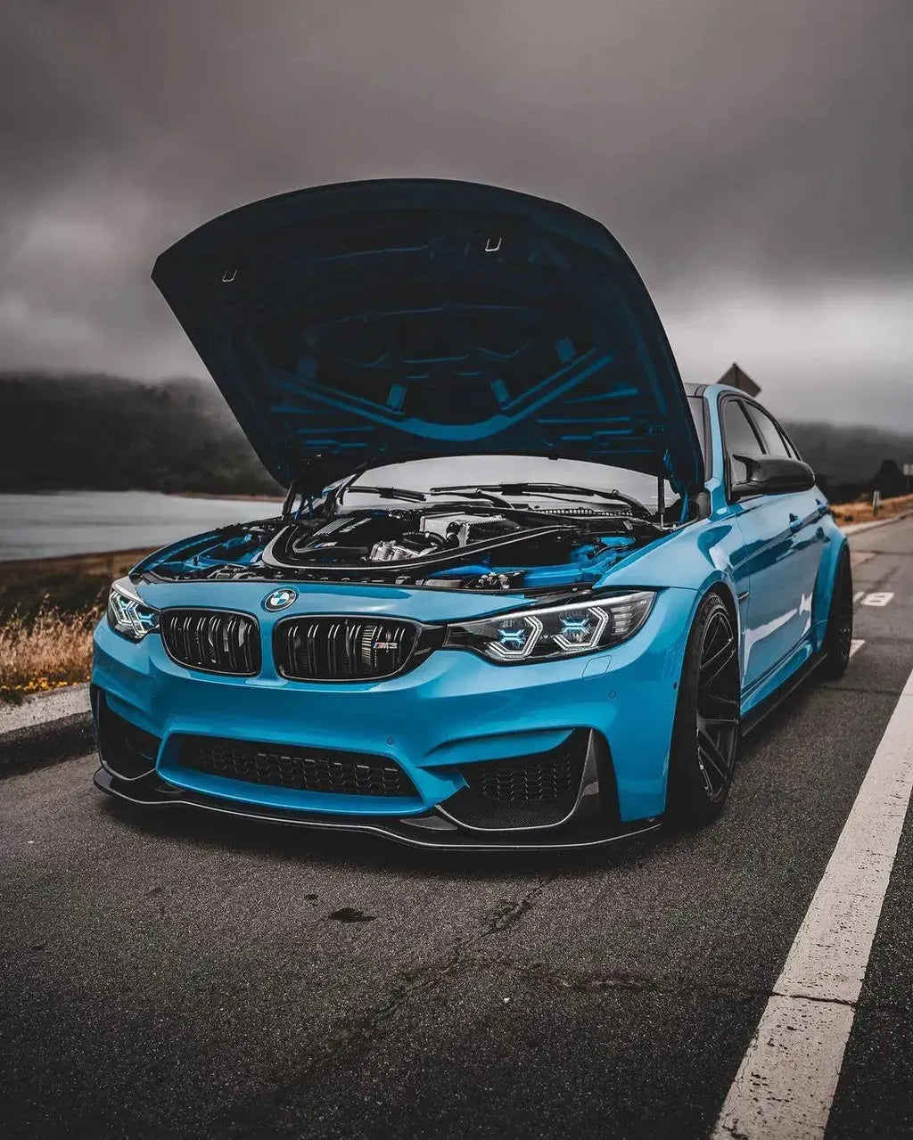 Blue BMW F80 M3 with open hood, angled front, carbon front lip (PSM Style)