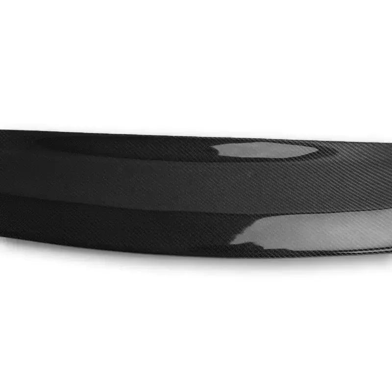 Glossy carbon weave close-up on the front lip surface (PSM Style) – BMW F80 M3 / F82 M4