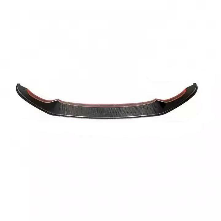 One-piece carbon front lip with red adhesive tape, front view (V1 Style) – BMW F80 M3 / F82 M4