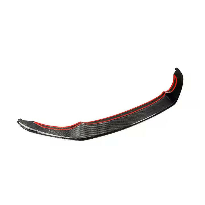 Carbon fiber front lip, angled view, on a white background (V1 Style) – BMW F80 M3 / F82 M4
