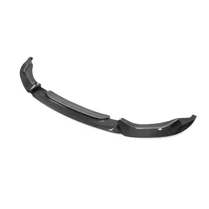 One-piece carbon fiber front lip, angled view (Varis Style) – BMW F80 M3 / F82 M4