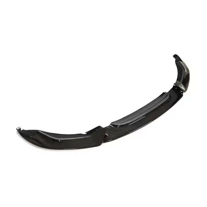 Carbon fiber front lip from the left end, angled (Varis Style) – BMW F80 M3 / F82 M4
