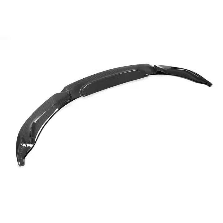 Carbon front lip at an angle, viewed from the right end (Varis Style) – BMW F80 M3 / F82 M4