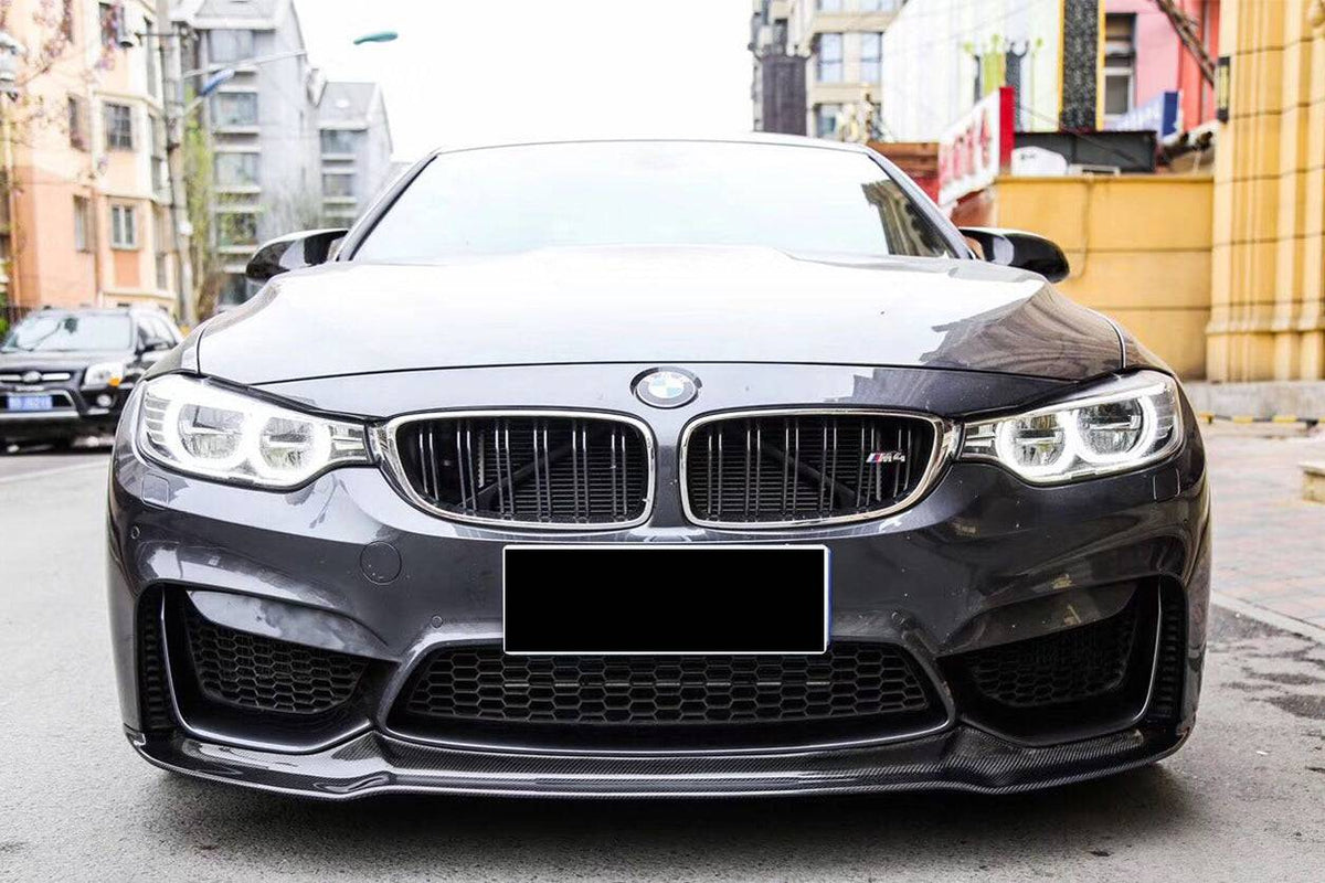 Gray BMW F82 M4, front view on the street, fitted carbon front lip (VRS Style)