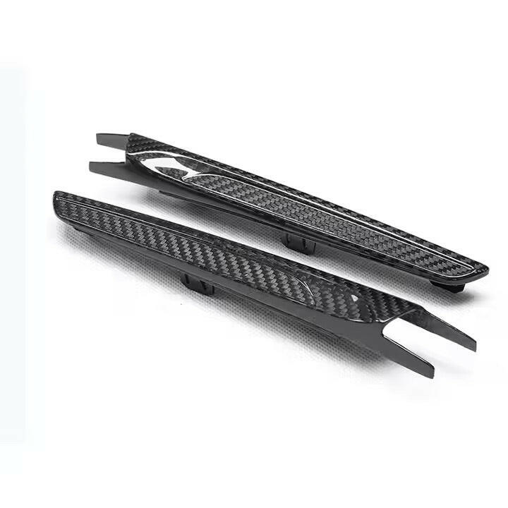 Carbon fender vent trim pair, 2 pieces on a white background – BMW F80 M3 / F82 M4
