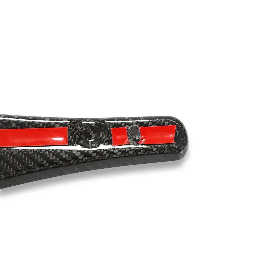 Narrow end of front mud flap, close-up, carbon weave and adhesive tape – BMW F80 M3 / F82 M4