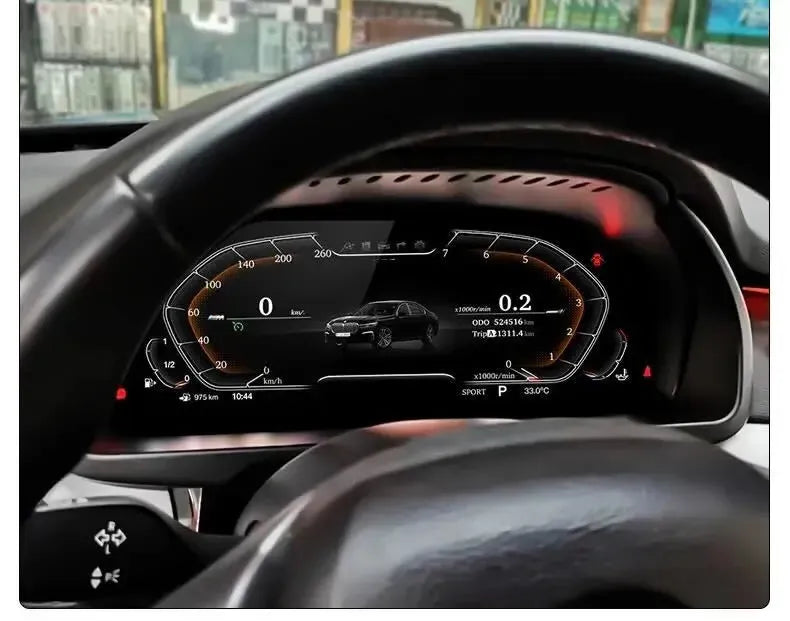 Installed digital instrument cluster behind the steering wheel, with display switched on – BMW F80 M3
