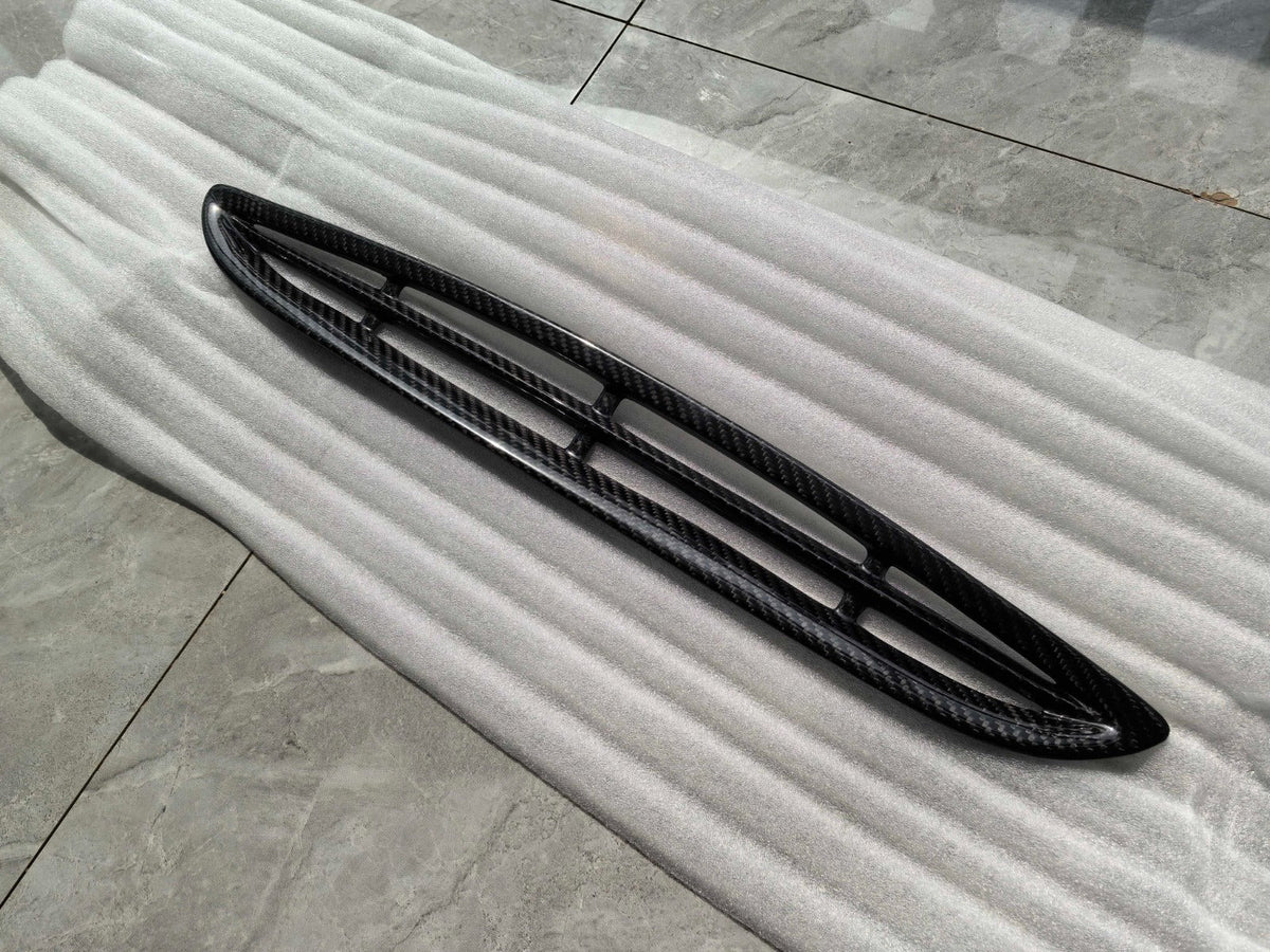 Carbon hood vent insert, top view, on gray foam (GTS Style) – BMW F80 M3 / F82 M4