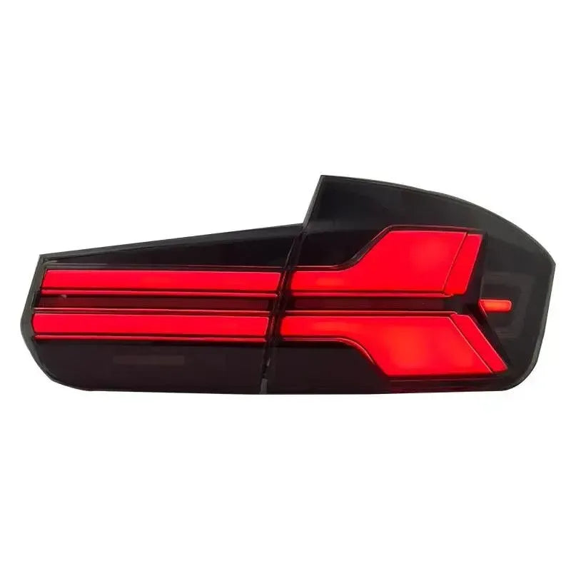 Smoked tail light with illuminated brake light, on a white background (X5M LCI Style) – BMW F80 M3 / F30
