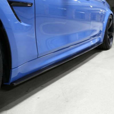 Blue BMW M4 side view, with fitted thin carbon side skirt extension (3D Style V1)