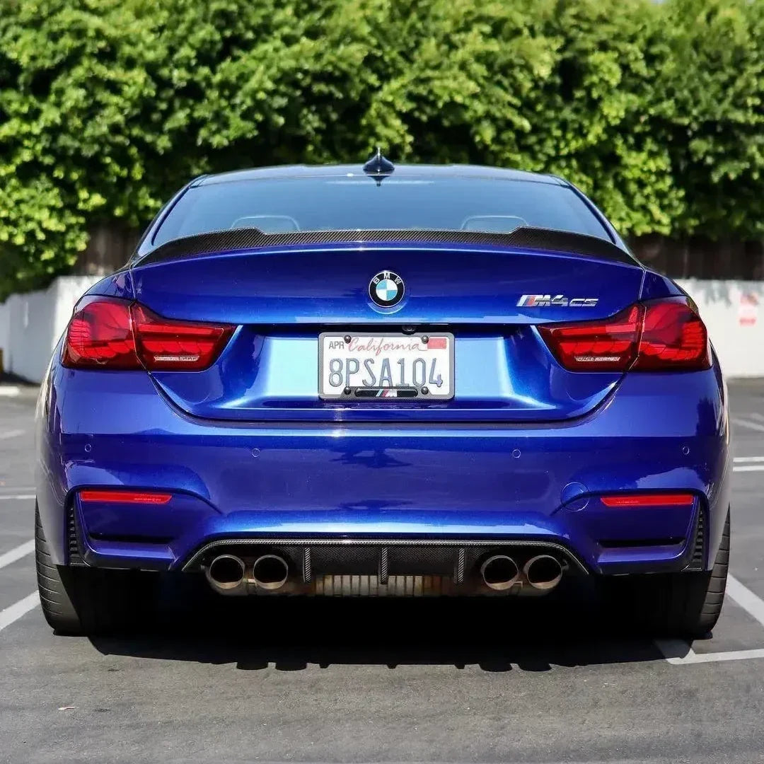 Blue BMW F82 M4 CS rear view, with fitted carbon trunk spoiler (CS Style)