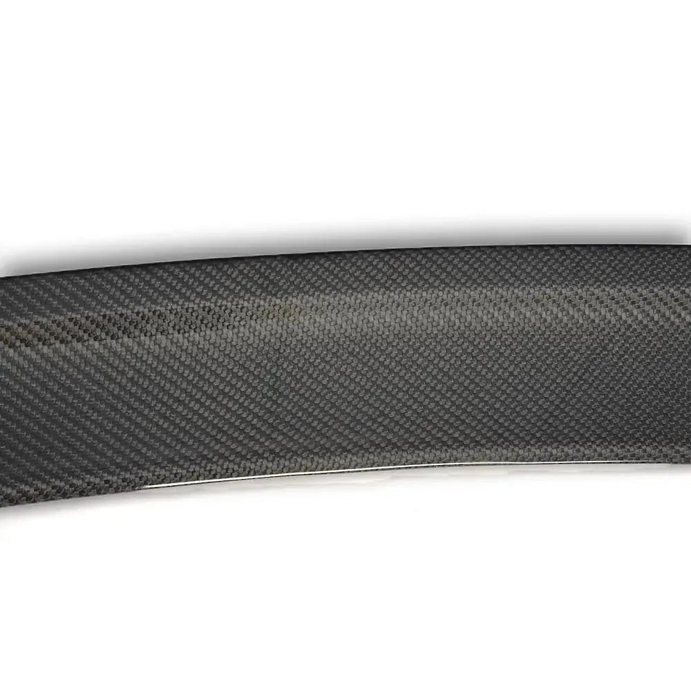 Spoiler lip and carbon weave in a close-up shot (Exotic Style) – BMW F82 M4 / F83 M4