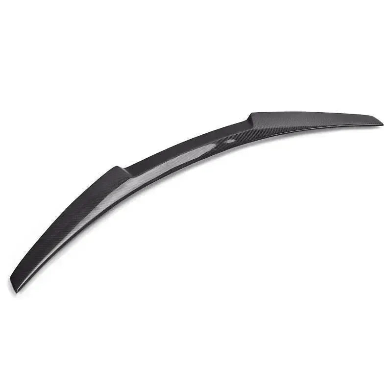 Glossy carbon ducktail trunk spoiler, angled view (M4 Style) – BMW F82 M4 / F83 M4