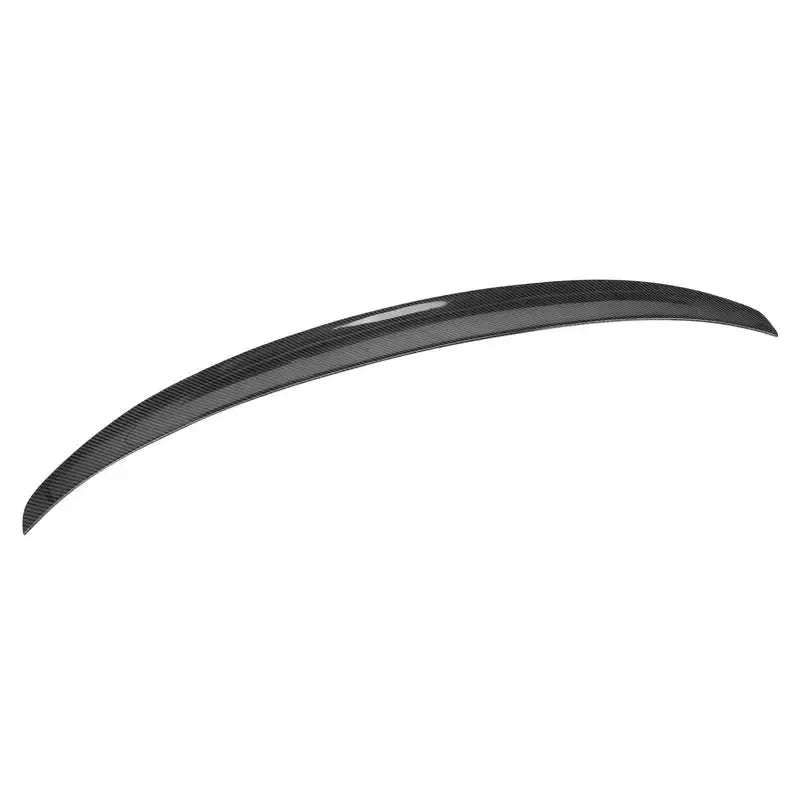 Glossy carbon trunk spoiler, angled side view, with slightly upturned ends (MP Style) – BMW F82 M4 / F83 M4