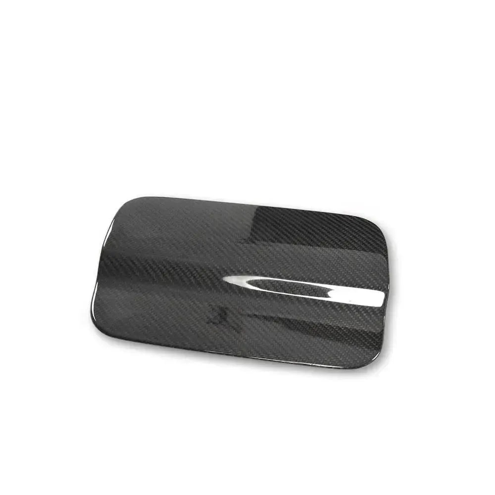 Glossy carbon fiber fuel cap cover, top view – BMW F82 M4 / F83 M4