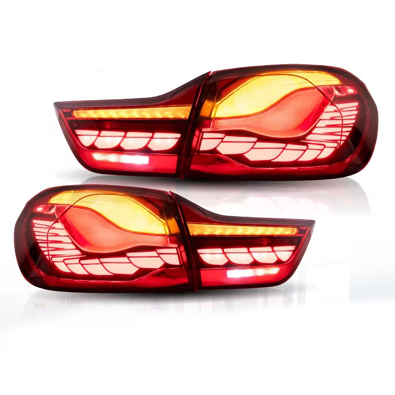 Red sequential OLED tail light pair with lit orange turn signal (GTS Style) – BMW F82 M4 / F32