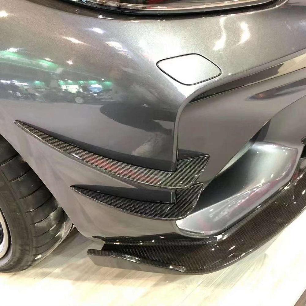 Front bumper of a gray BMW F87 M2 with fitted PM V1 Style carbon fiber canards