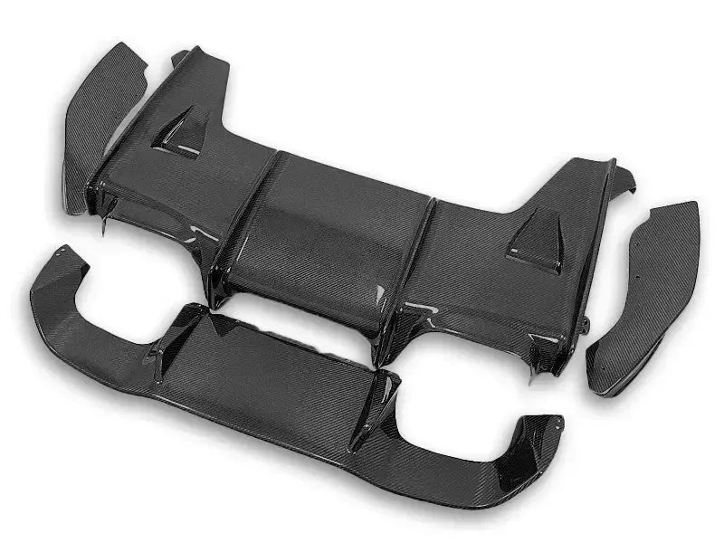 Multi-piece carbon fiber rear diffuser set, angled view (PSM Style) – BMW F87 M2