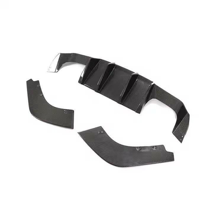 Three-piece carbon fiber rear diffuser set, angled view (V Style) – BMW F87 M2