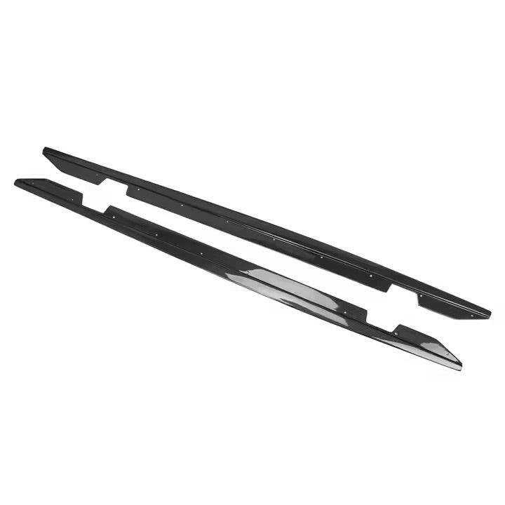 Carbon fiber side skirt extensions, angled view (MP Style) – BMW F87 M2