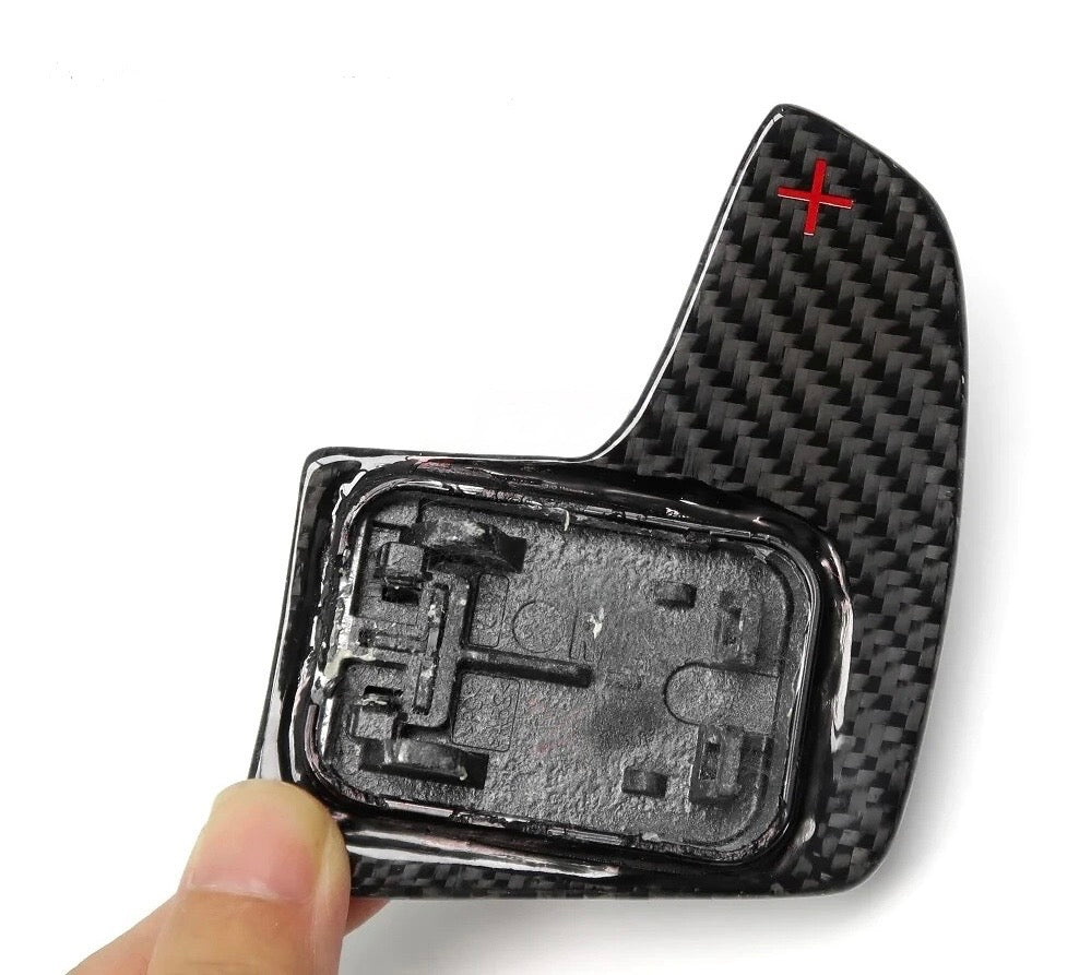 Mounting base of a hand-held carbon paddle shifter, close-up – BMW G Series