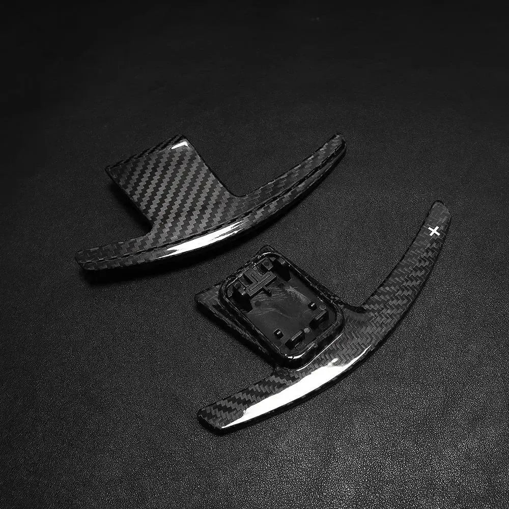Gloss carbon paddle shifters stacked, angled view (Competition Style) – BMW G87 M2 / G80 M3 / G82 M4