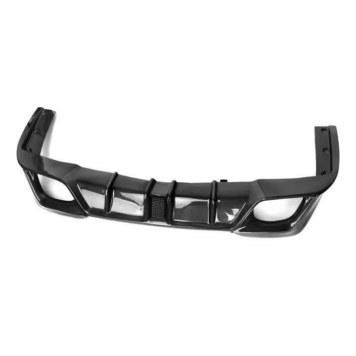 Carbon rear diffuser with LED brake light, slightly angled rear view (CMST Style LED) – BMW G20 3 Series