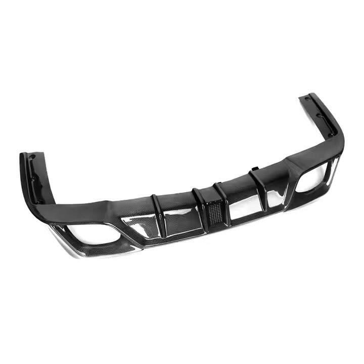 Carbon fiber diffuser with LED brake light, three-quarter view (CMST Style LED) – BMW G20 3 Series