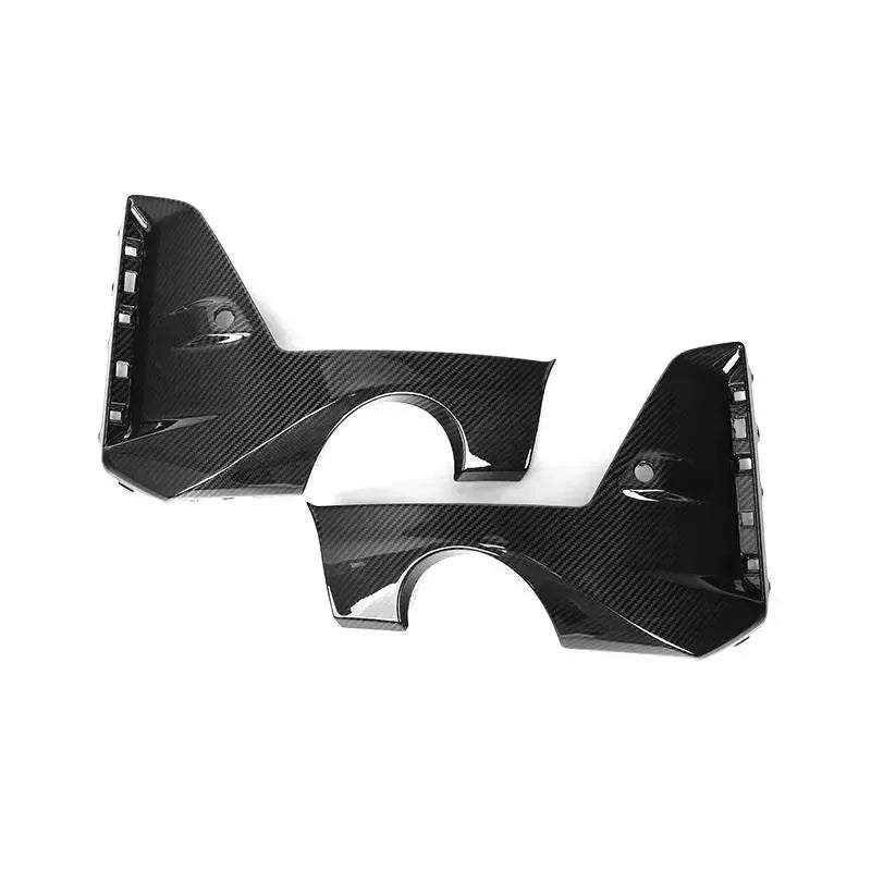 The two carbon side corner pieces of the rear diffuser against a white background (Euro Style) – BMW G20 3 Series