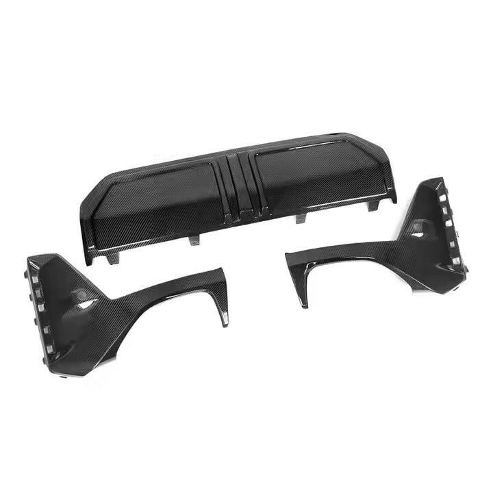 Three-piece carbon fiber rear diffuser from an angle (MP Style) – BMW G20 3 Series