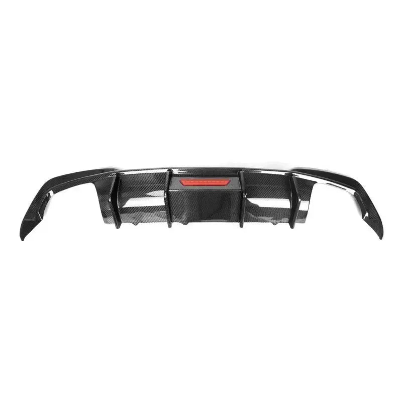 Carbon diffuser with four vertical fins and horizontal red brake light, from the rear (TK Style) – BMW G20 3 Series