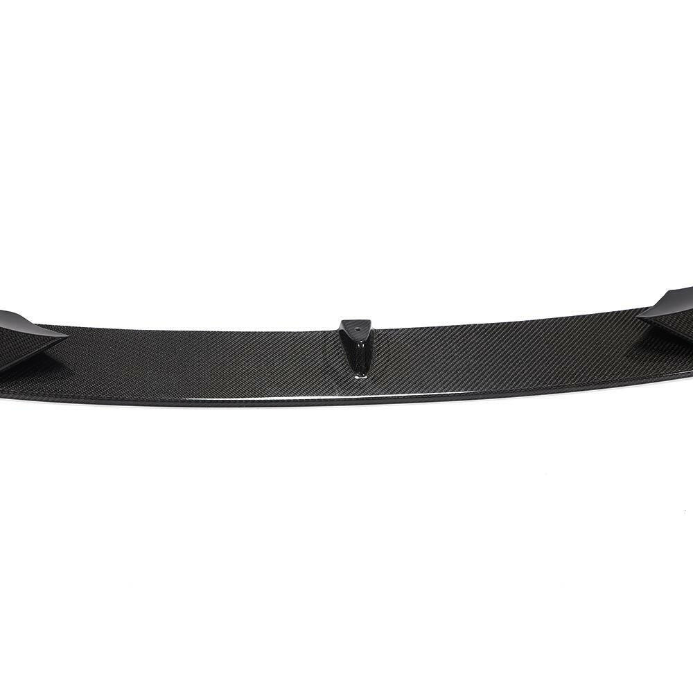 Center piece of the carbon front lip with the mounting tab, close-up (AC Style) – BMW G20 3 Series