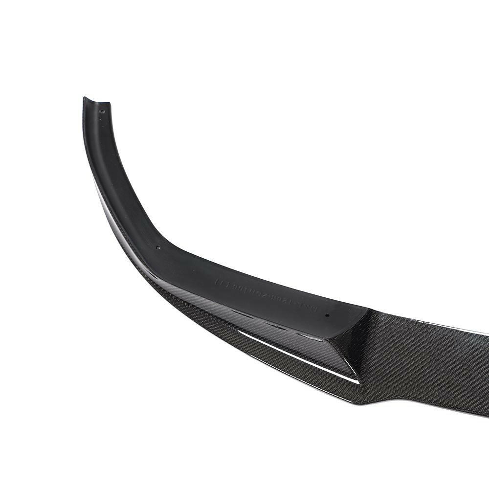 Side end of the carbon front lip close-up, against a white background (Euro Style V3) – BMW G20 3 Series