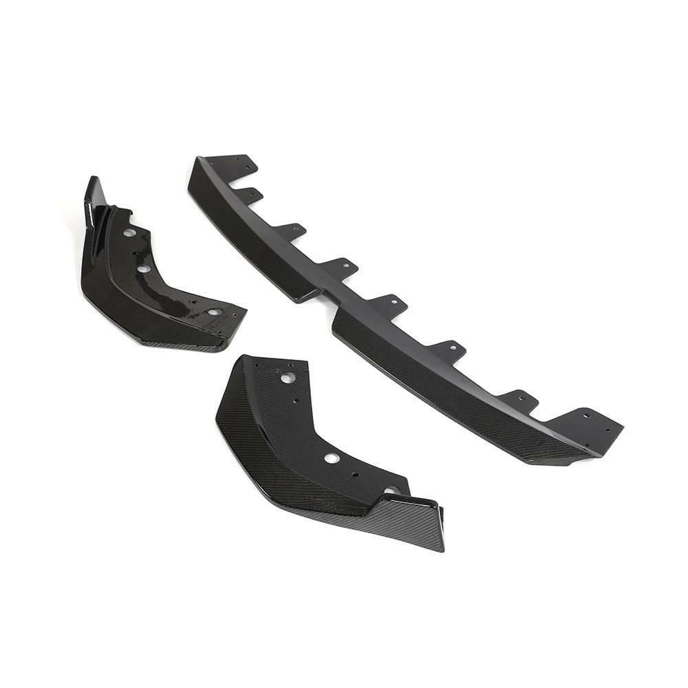Three-piece carbon front lip from an angle, against a white background (Performance Style) – BMW G20 3 Series