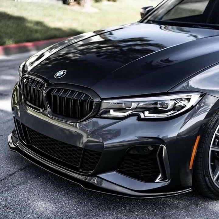 Dark gray pre-LCI BMW G20 front three-quarter close-up, with fitted carbon front lip (V Style)