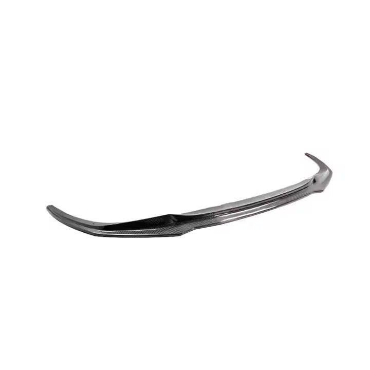One-piece carbon fiber front lip from a low side angle (V Style) – BMW G20 3 Series