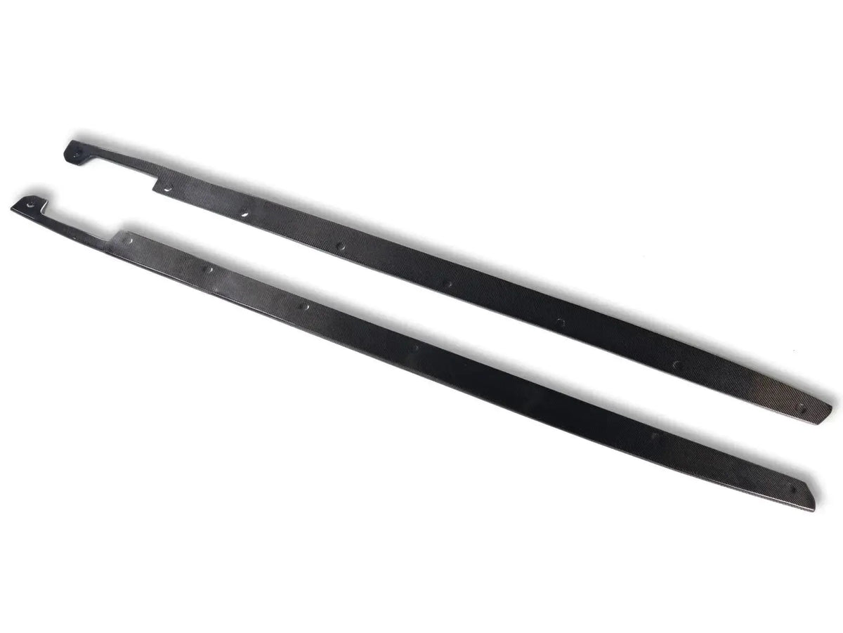 Two carbon side skirt extensions photographed from another angle (CMST Style) – BMW G20 3 Series