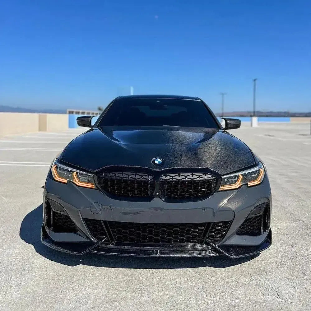 Dark gray pre-LCI BMW G20 from the front, headlights with orange DRL (Laser Style)