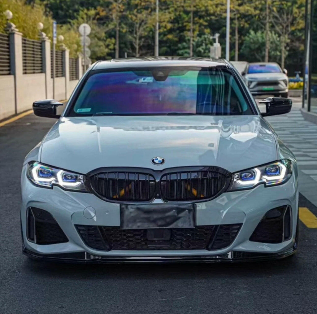 White BMW G20 from the front on the street, headlights with white DRL (M Style)