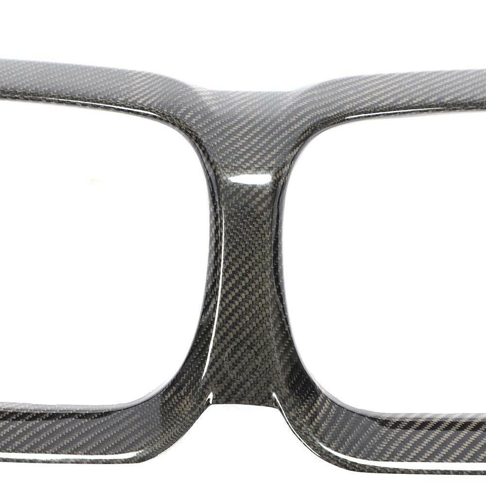 Close-up of the kidney grille surround cover's center bridge and carbon weave – BMW G20 3 Series