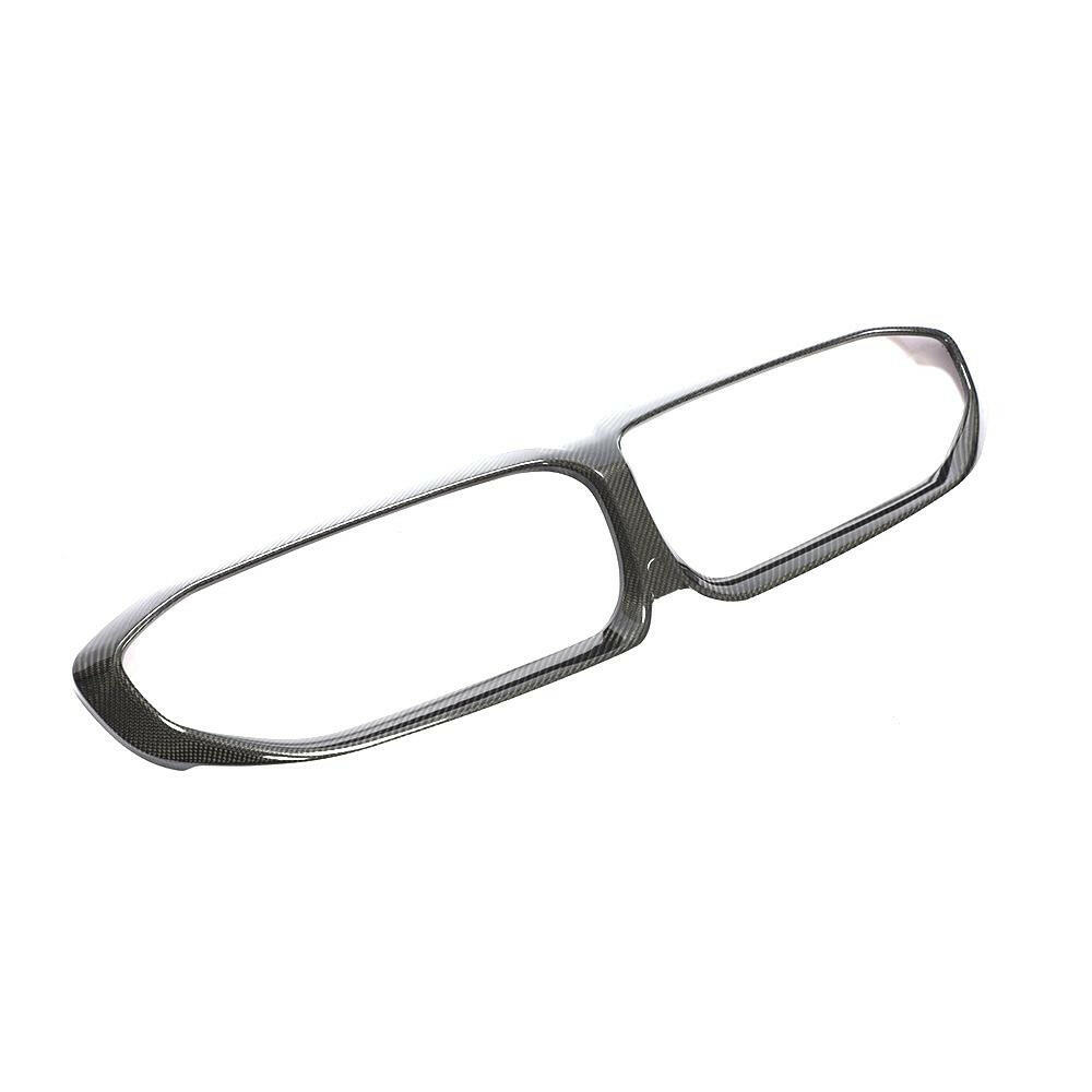 Carbon kidney grille surround cover from a low angle, on a white background – BMW G20 3 Series