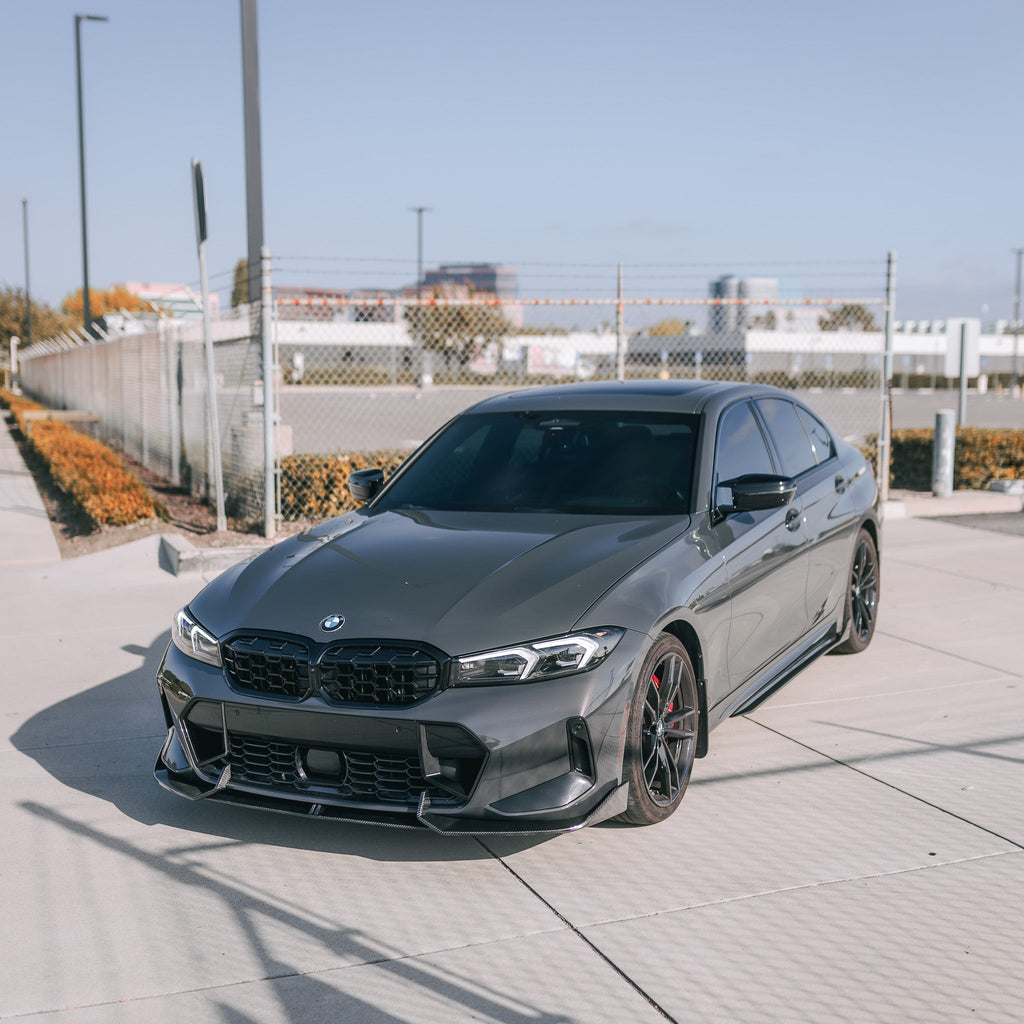 Gray BMW G20 LCI, front three-quarter view, with fitted gloss black diamond-pattern kidney grille (Diamond Style)