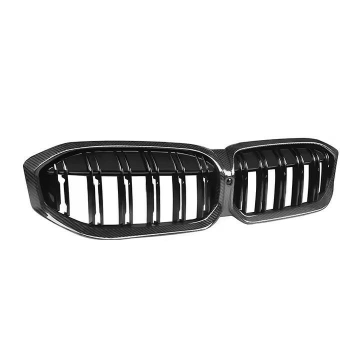 Double-slat carbon kidney grille, left three-quarter view – BMW G20 3 Series
